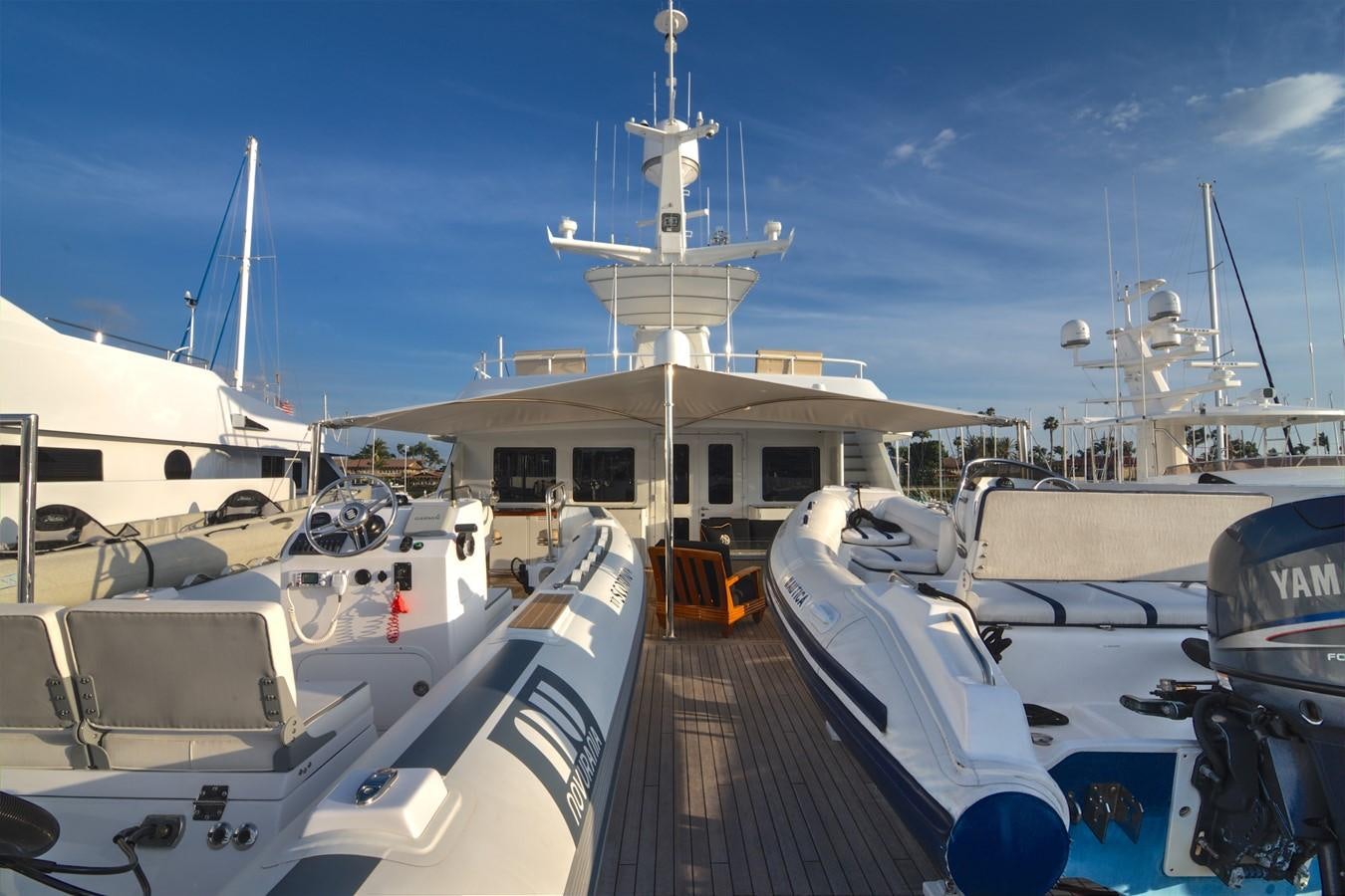 a boat docked at a pier aboard SCORPIO Yacht for Sale