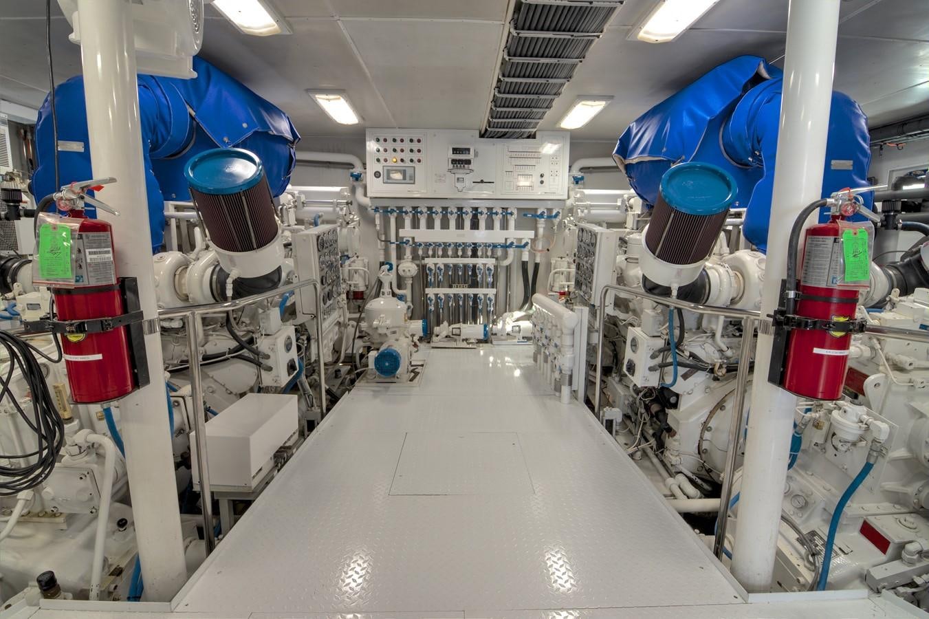 a room with white and blue machinery aboard SCORPIO Yacht for Sale