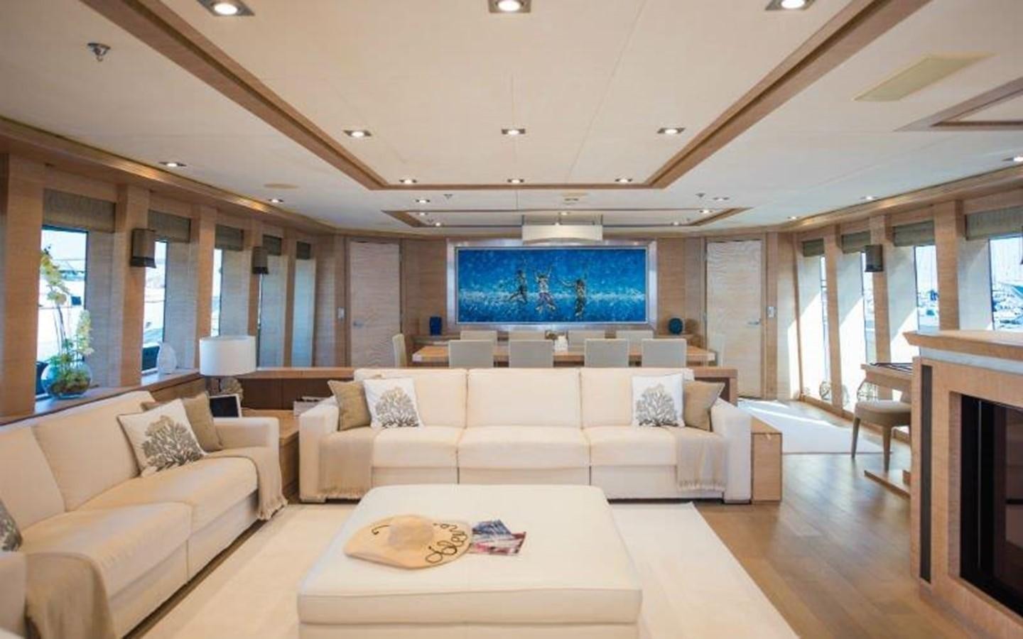 a living room with a large screen aboard NORMA JEAN Yacht for Sale