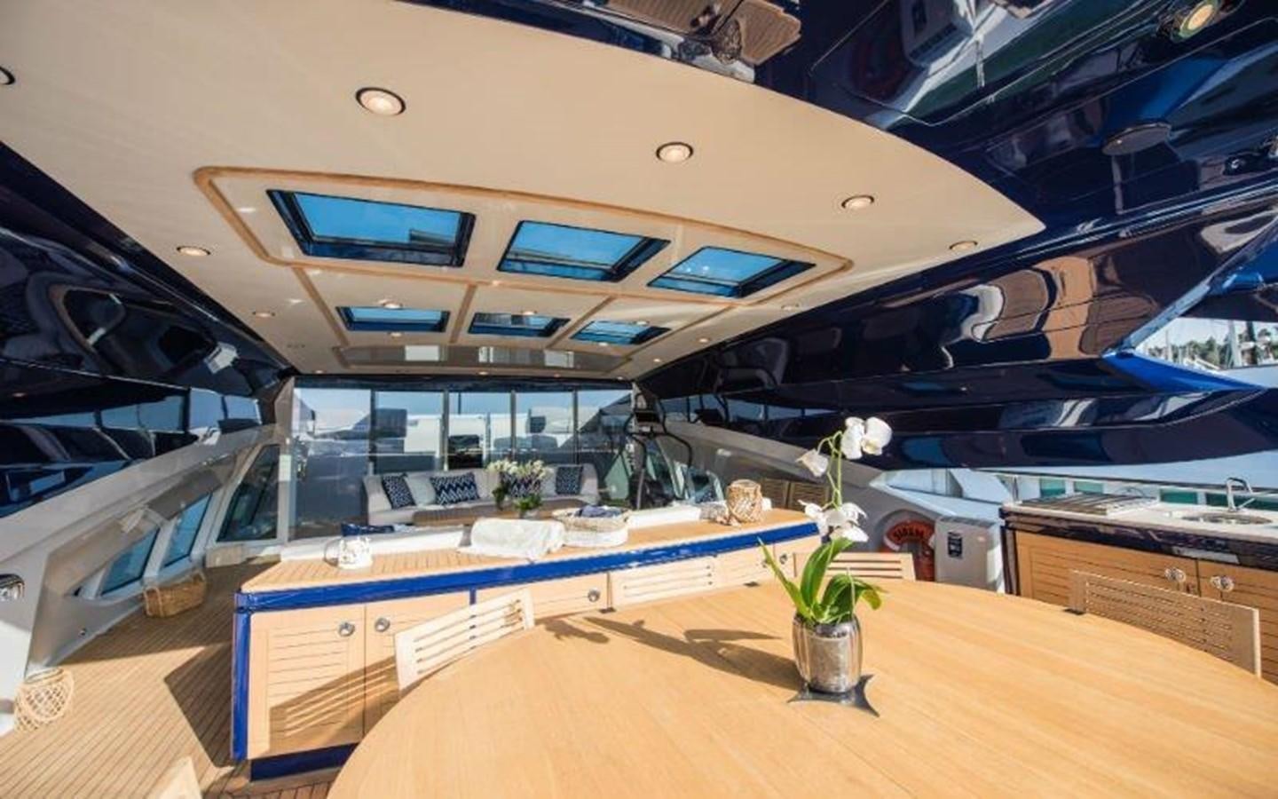 a room with a table and chairs aboard NORMA JEAN Yacht for Sale