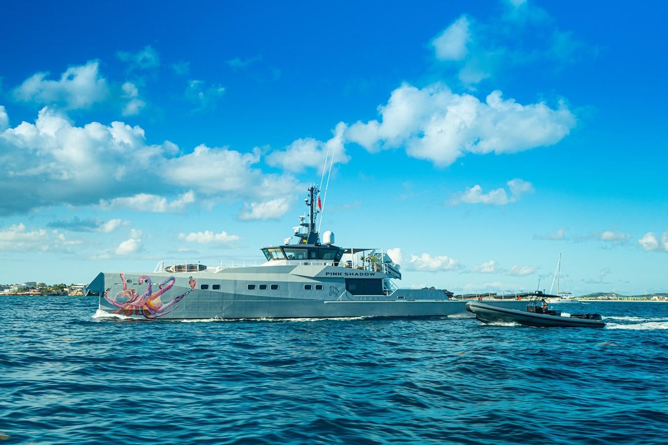 a couple of boats in the water aboard BAD COMPANY SUPPORT Yacht for Sale