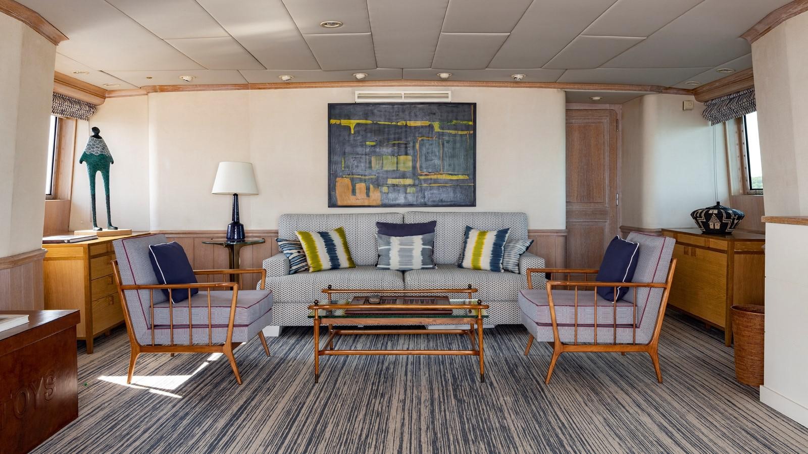 a living room with a couch and chairs aboard NATALIA V Yacht for Sale