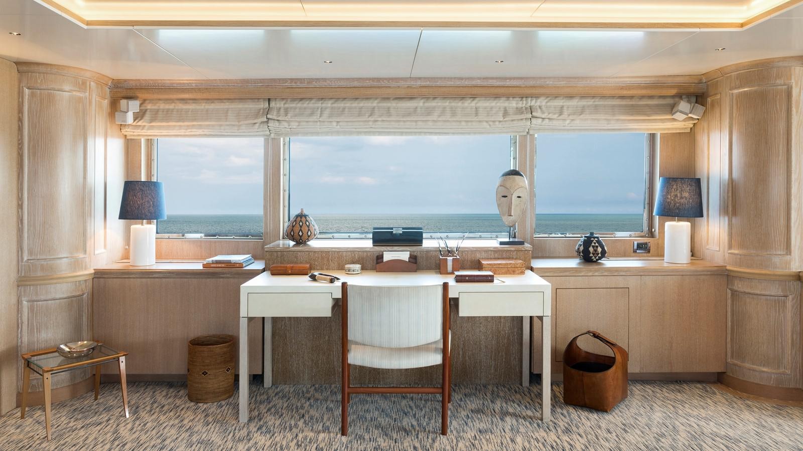a kitchen with a large window aboard NATALIA V Yacht for Sale