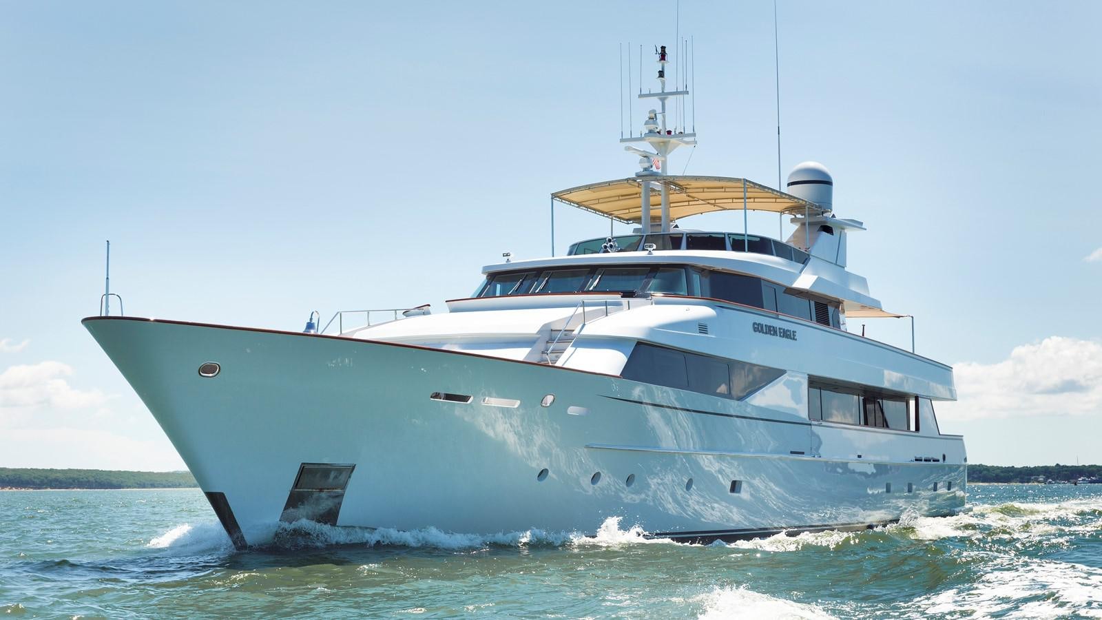 a large white boat in the water aboard NATALIA V Yacht for Sale