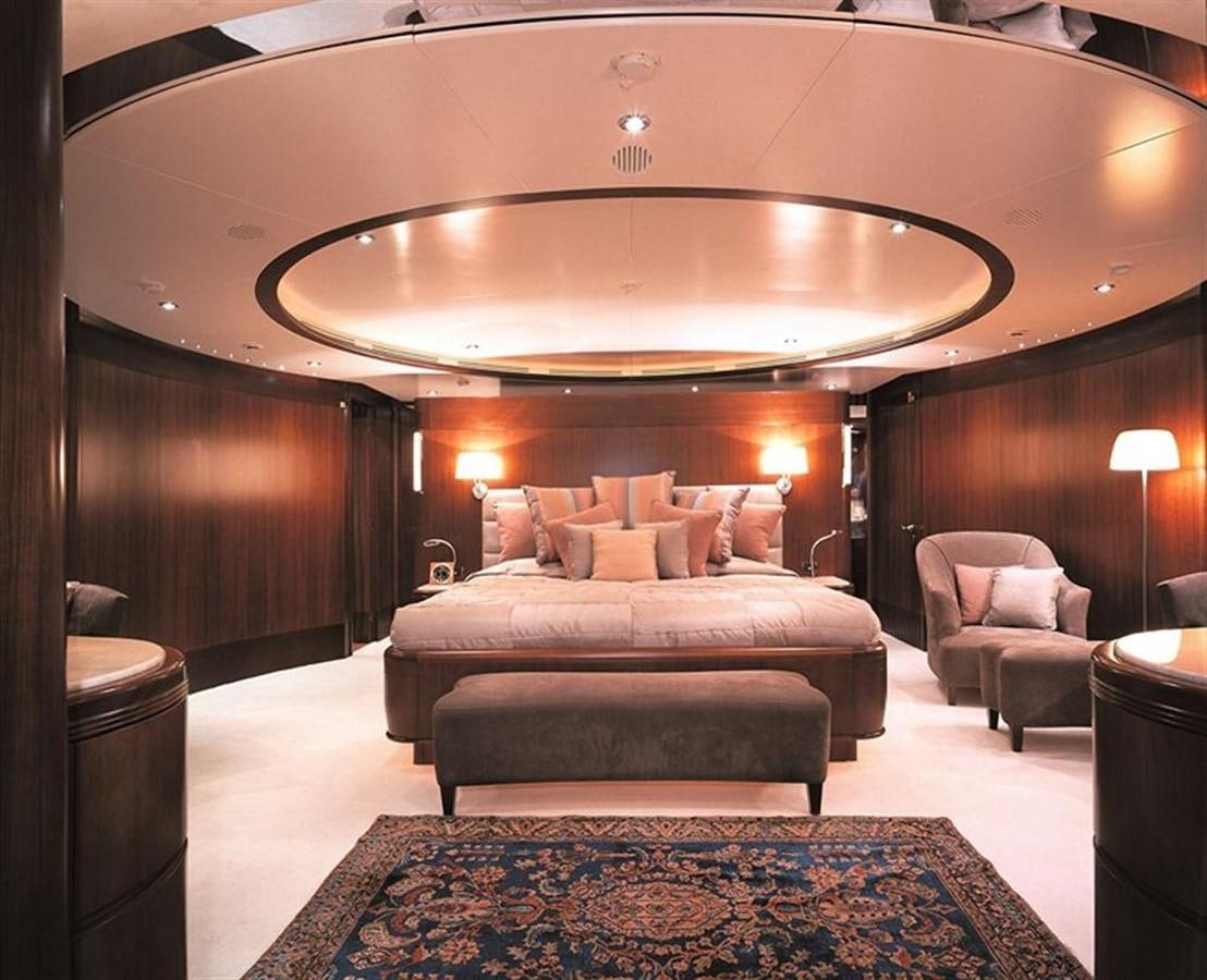 a large room with a large chandelier aboard MORE Yacht for Sale