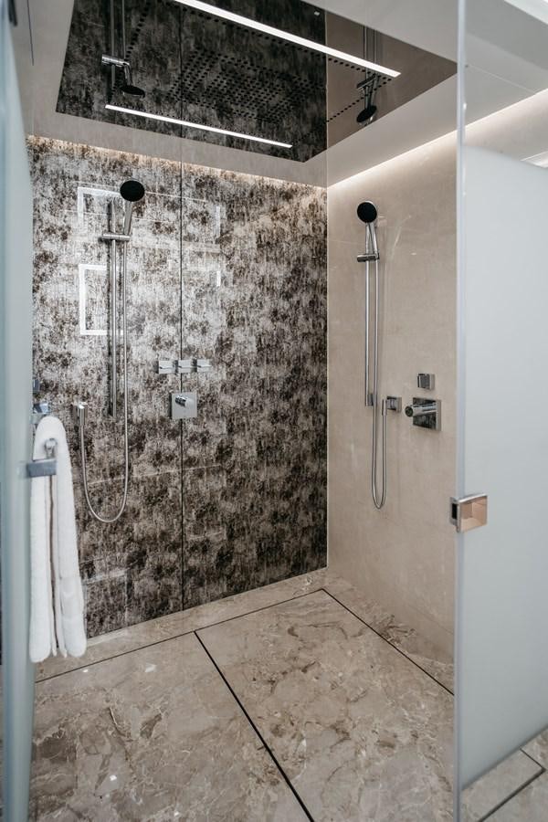 a bathroom with a shower and a sink aboard BERING B145 #02 Yacht for Sale