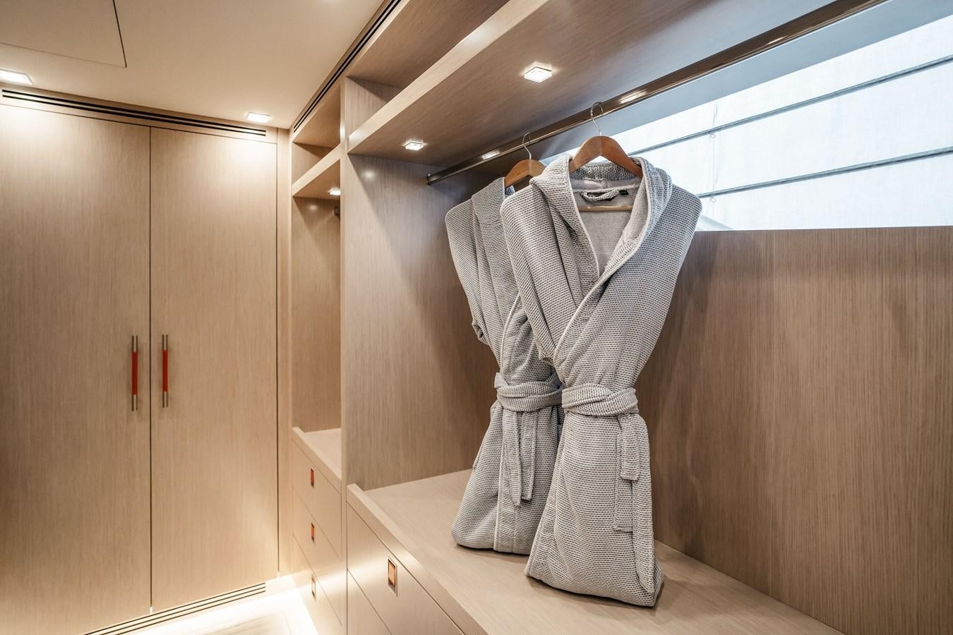 a mannequin in a suit aboard BERING B145 #02 Yacht for Sale