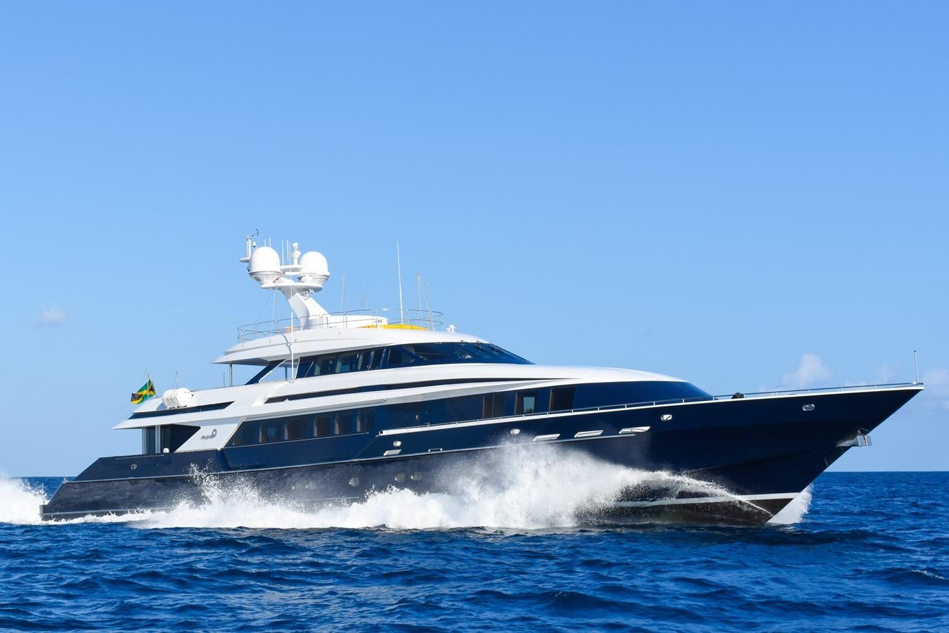 a large boat in the water aboard OCTOPUSSY Yacht for Sale