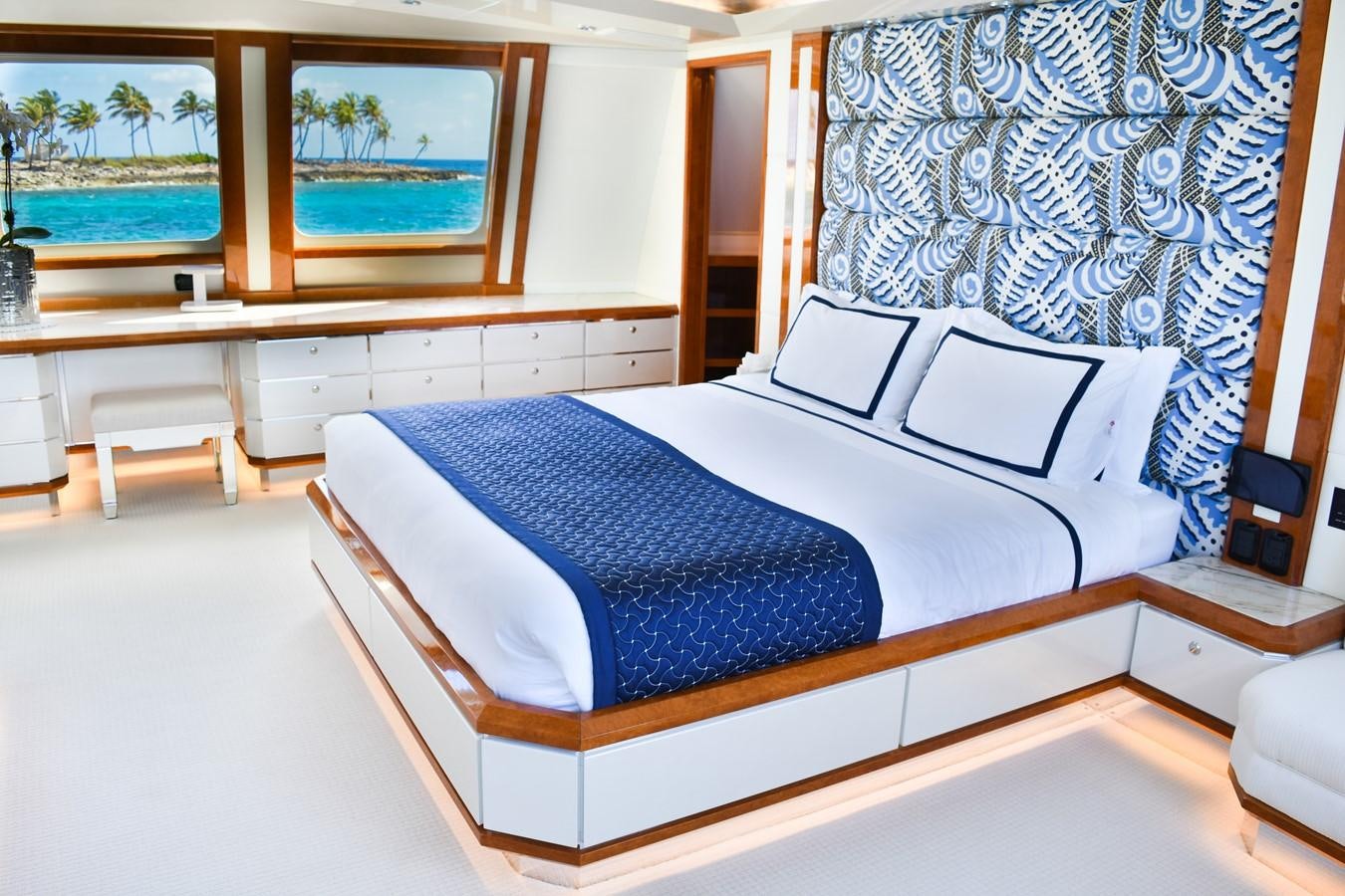 a bed in a room aboard OCTOPUSSY Yacht for Sale