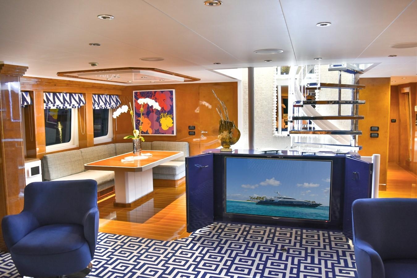 a room with a computer and a chair aboard OCTOPUSSY Yacht for Sale