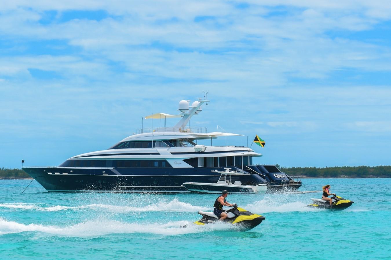 a boat with a boat in the water aboard OCTOPUSSY Yacht for Sale
