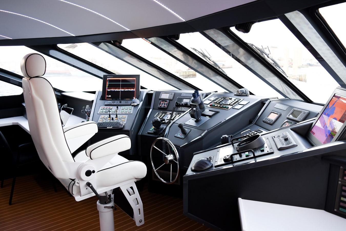 inside of a car aboard OCTOPUSSY Yacht for Sale