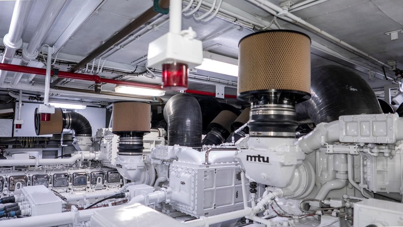 a machine with a large metal cylinder aboard OCTOPUSSY Yacht for Sale