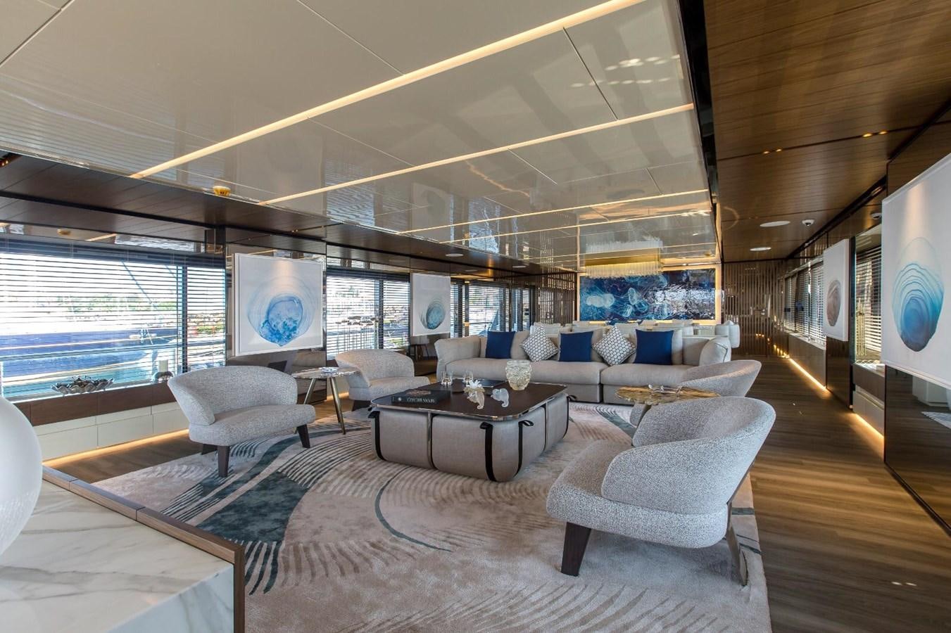 a large living room with a large window aboard HALARA (NAME RESERVED) Yacht for Sale