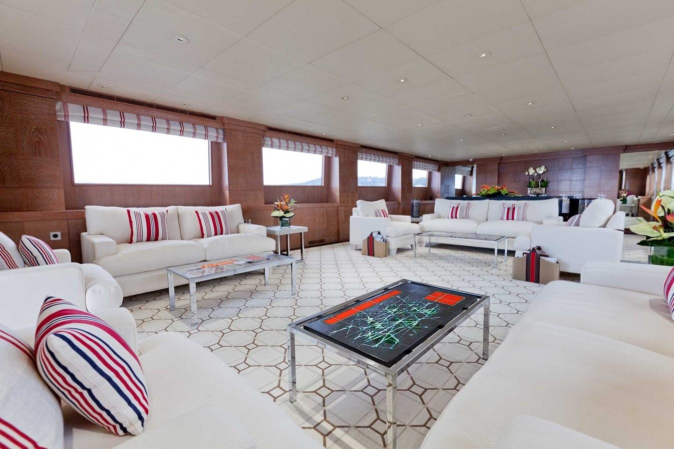 a room with a table and chairs aboard ELEMENT Yacht for Charter
