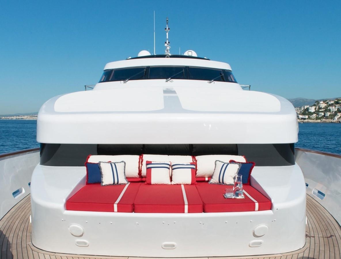 a white boat on a dock aboard ELEMENT Yacht for Charter