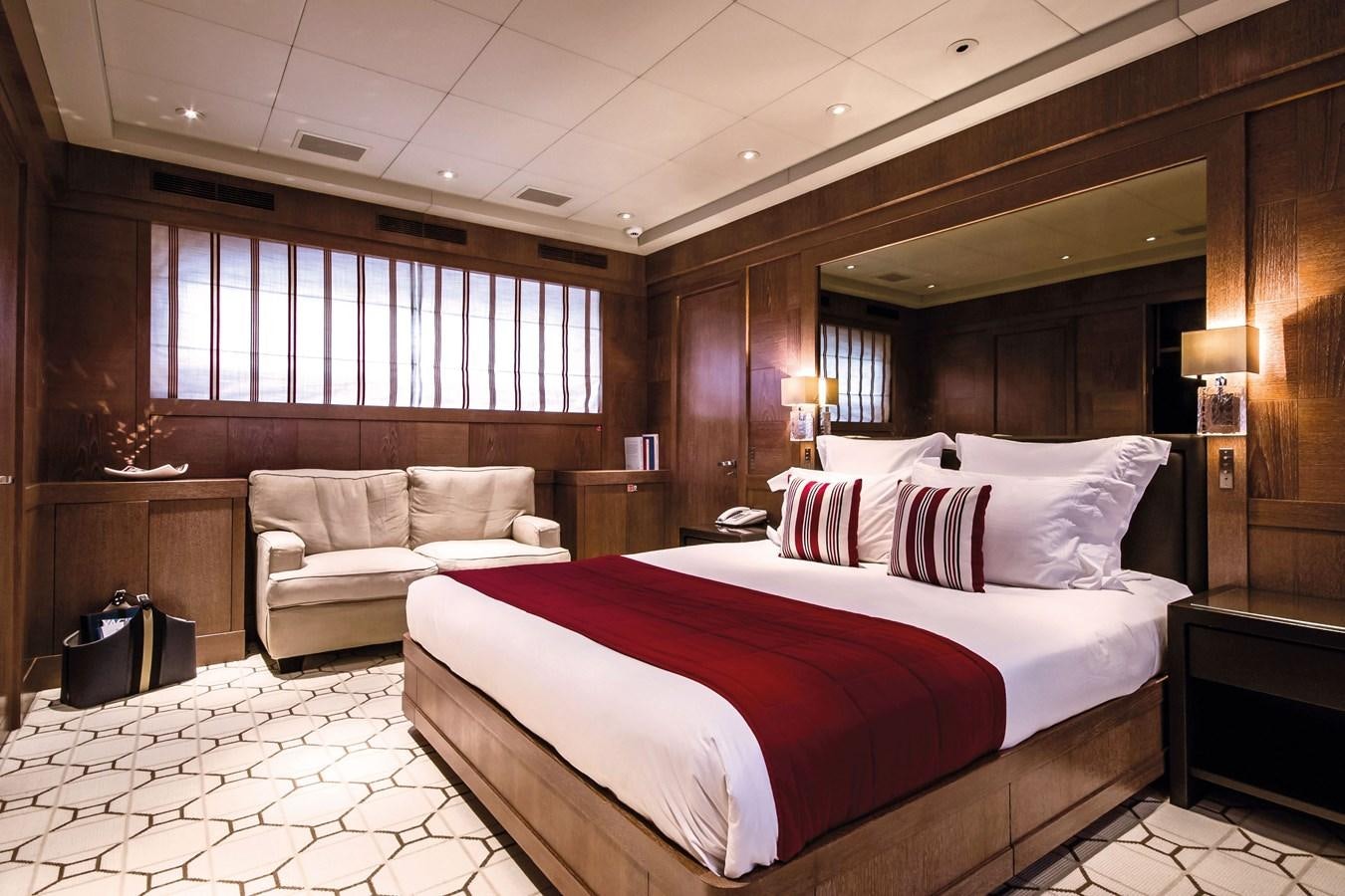 a bed in a room aboard ELEMENT Yacht for Sale