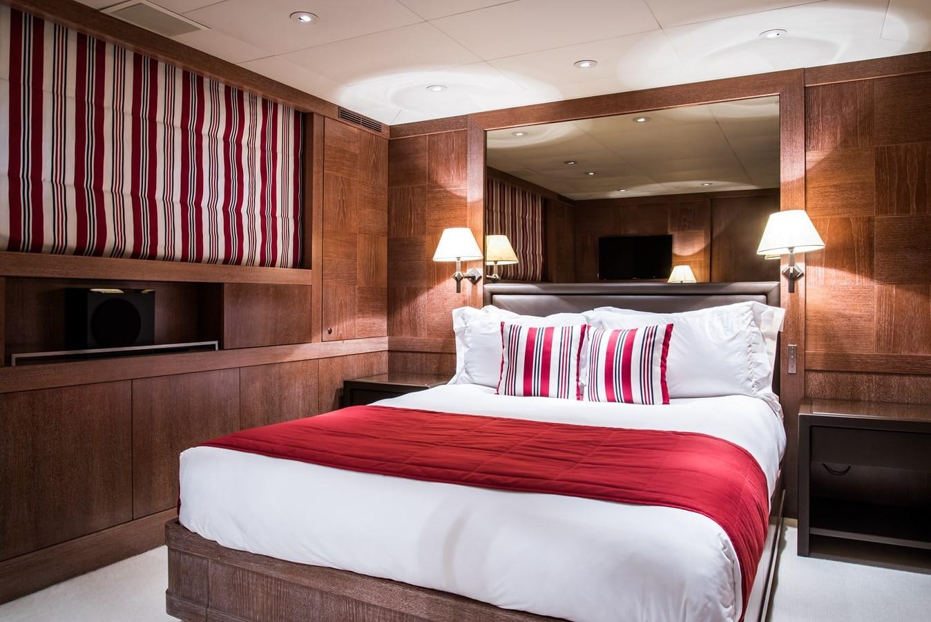 a bed in a room aboard ELEMENT Yacht for Charter