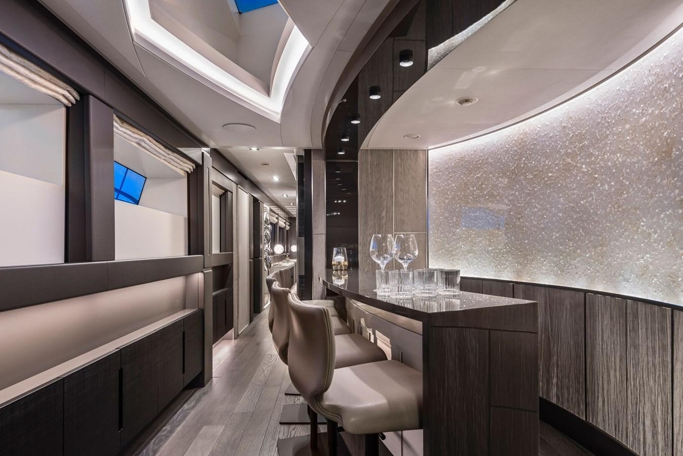 a room with a table and chairs aboard TOUCH ME Yacht for Sale