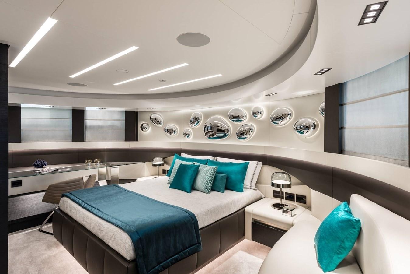 a room with a bed and a window aboard TOUCH ME Yacht for Sale