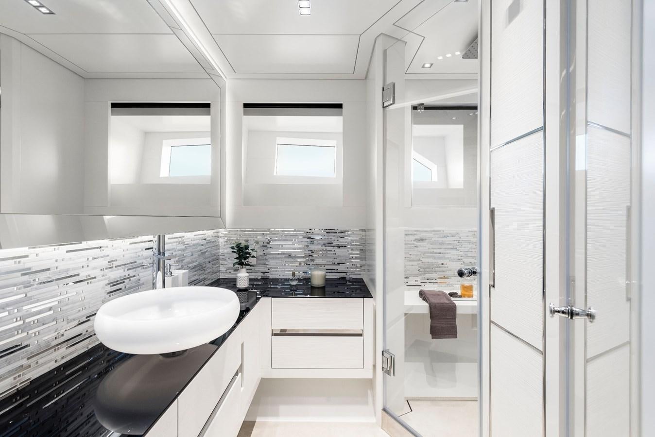 a bathroom with a sink and a shower aboard TOUCH ME Yacht for Sale