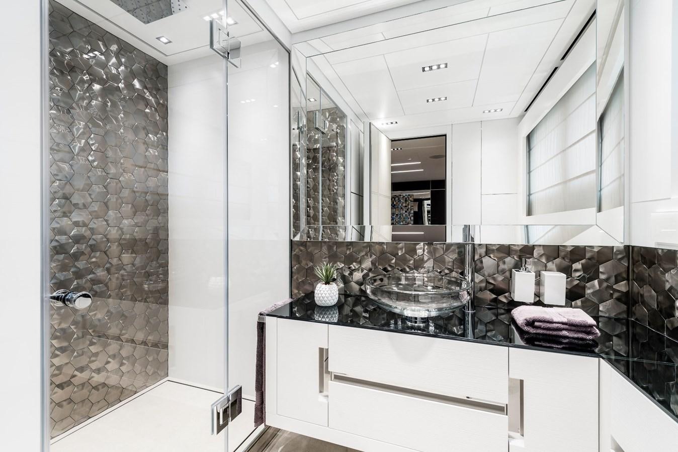 a bathroom with a marble counter top aboard TOUCH ME Yacht for Sale