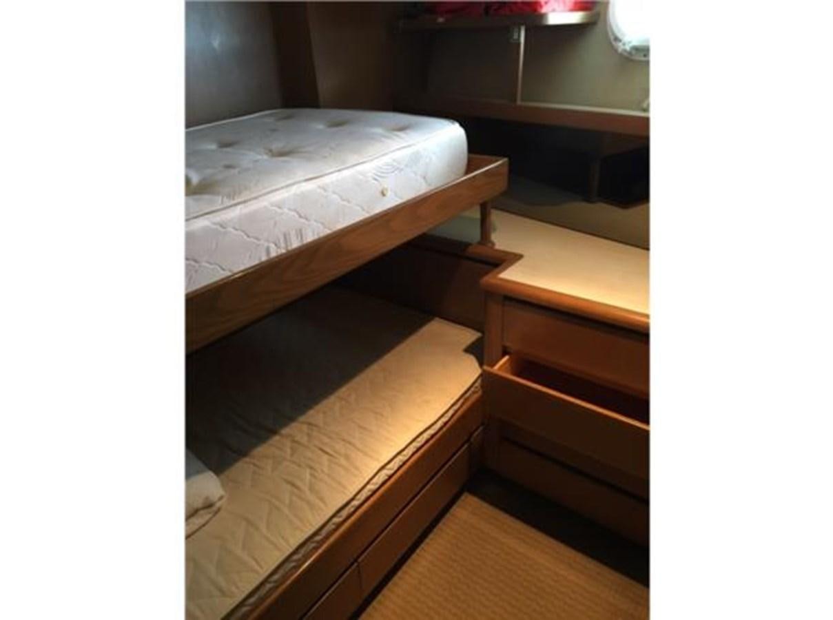 a bed with a mattress aboard MCY Yacht for Sale