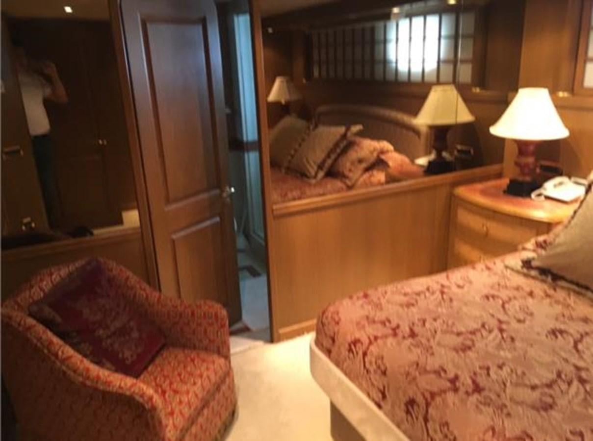 a room with two beds aboard MCY Yacht for Sale