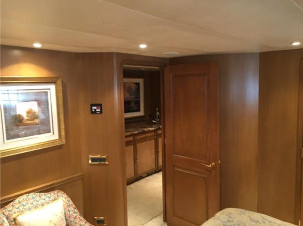 a room with a door and a mirror aboard MCY Yacht for Sale