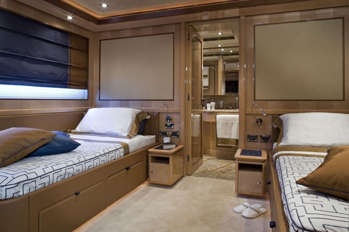 a room with two beds aboard BEHIKE Yacht for Sale