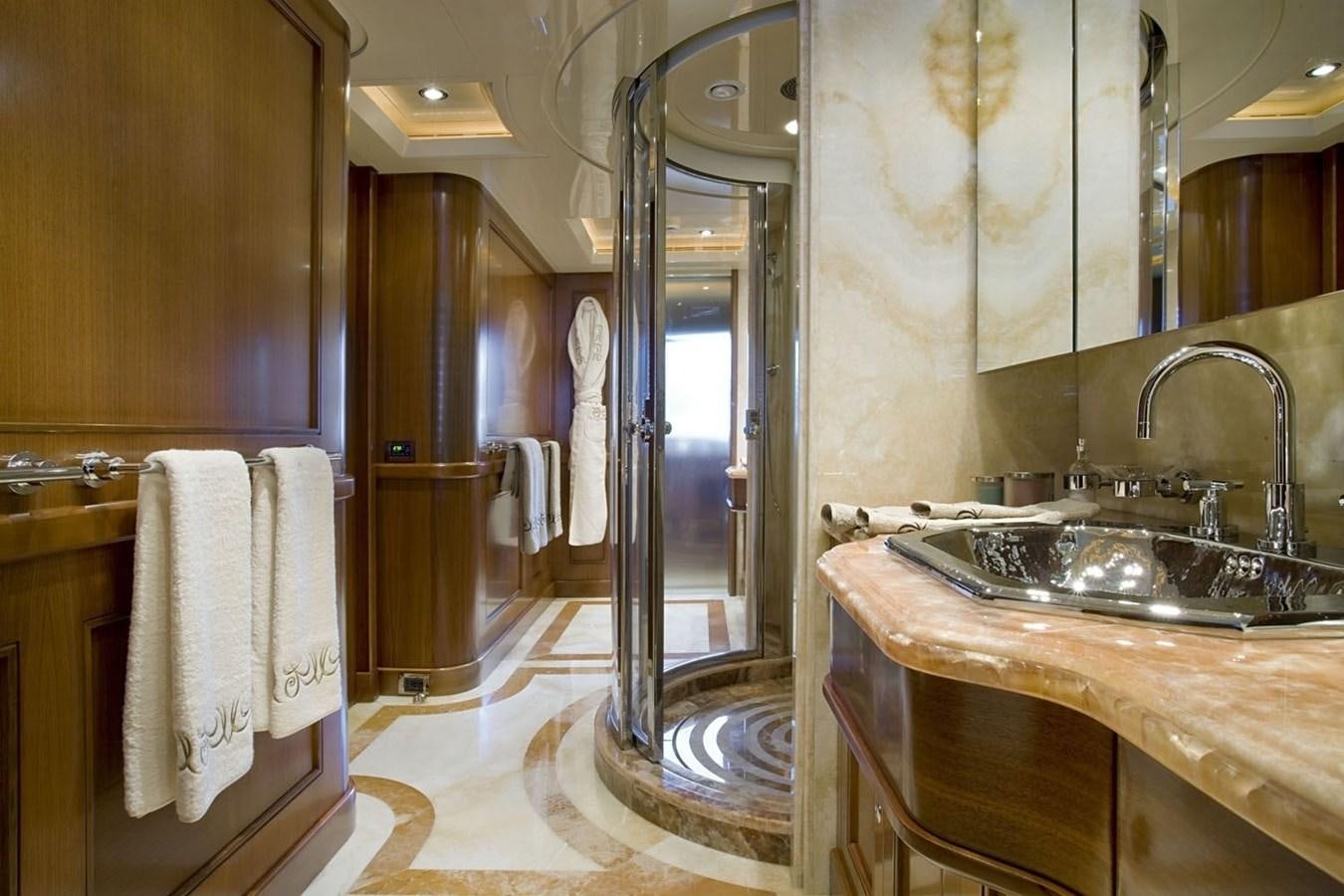 a bathroom with a sink and a mirror aboard BEHIKE Yacht for Sale