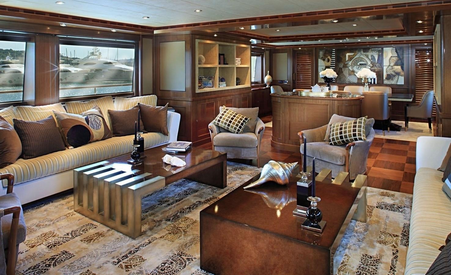 a living room with a couch and a coffee table aboard BEHIKE Yacht for Sale