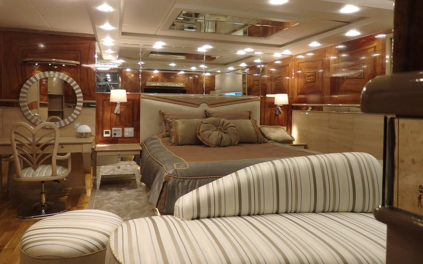 a large bedroom with a large bed aboard DESTINY Yacht for Sale
