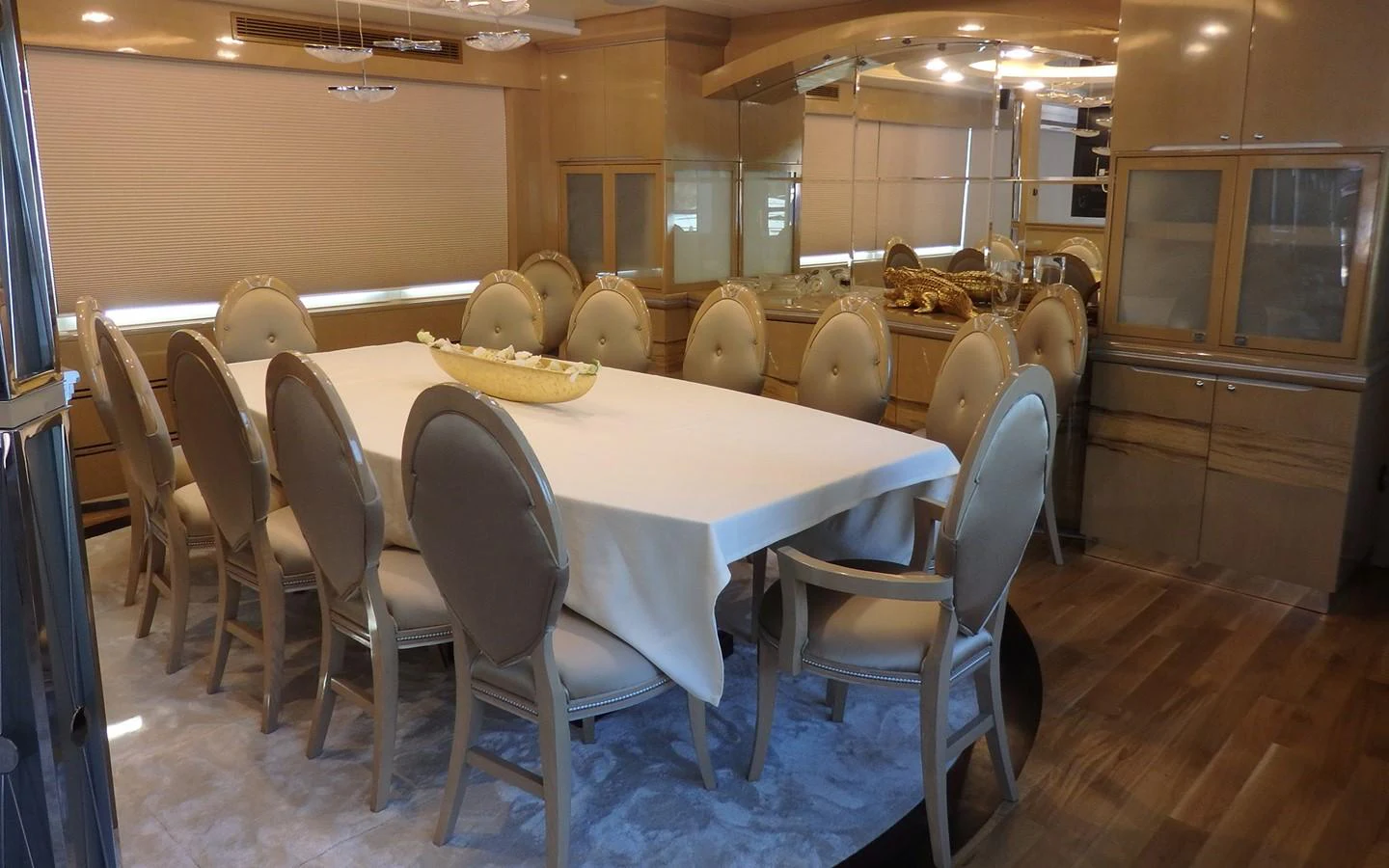 a room with tables and chairs aboard DESTINY Yacht for Sale