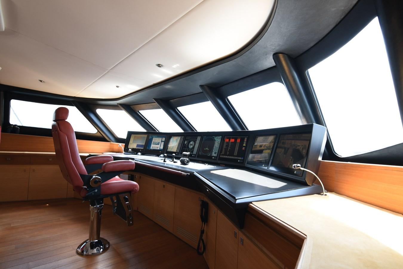 a room with a desk and chairs aboard LIFE SAGA Yacht for Sale