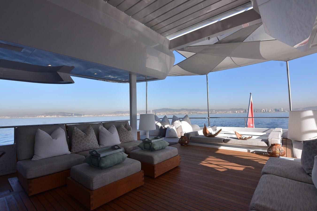 a living room with a view of the ocean aboard LIFE SAGA Yacht for Sale
