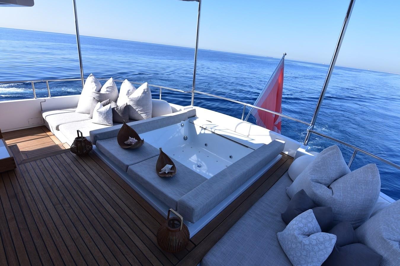 a boat on a deck aboard LIFE SAGA Yacht for Sale
