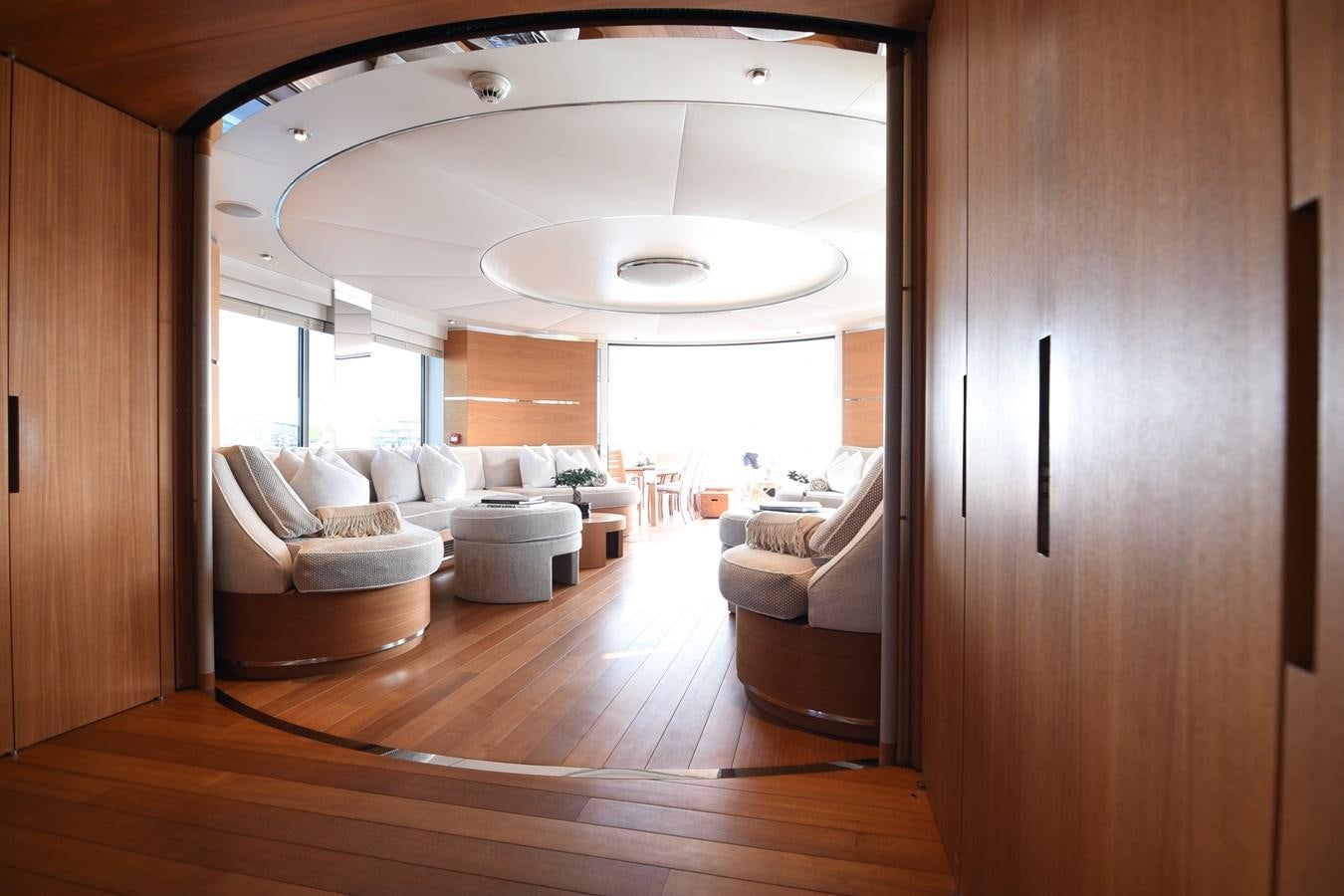 a living room with a large ceiling aboard LIFE SAGA Yacht for Sale