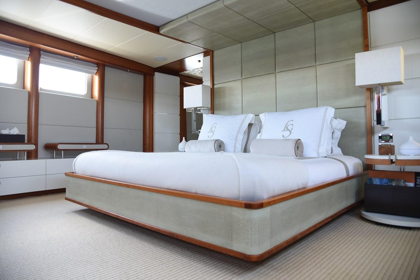 a large bed in a room aboard LIFE SAGA Yacht for Sale