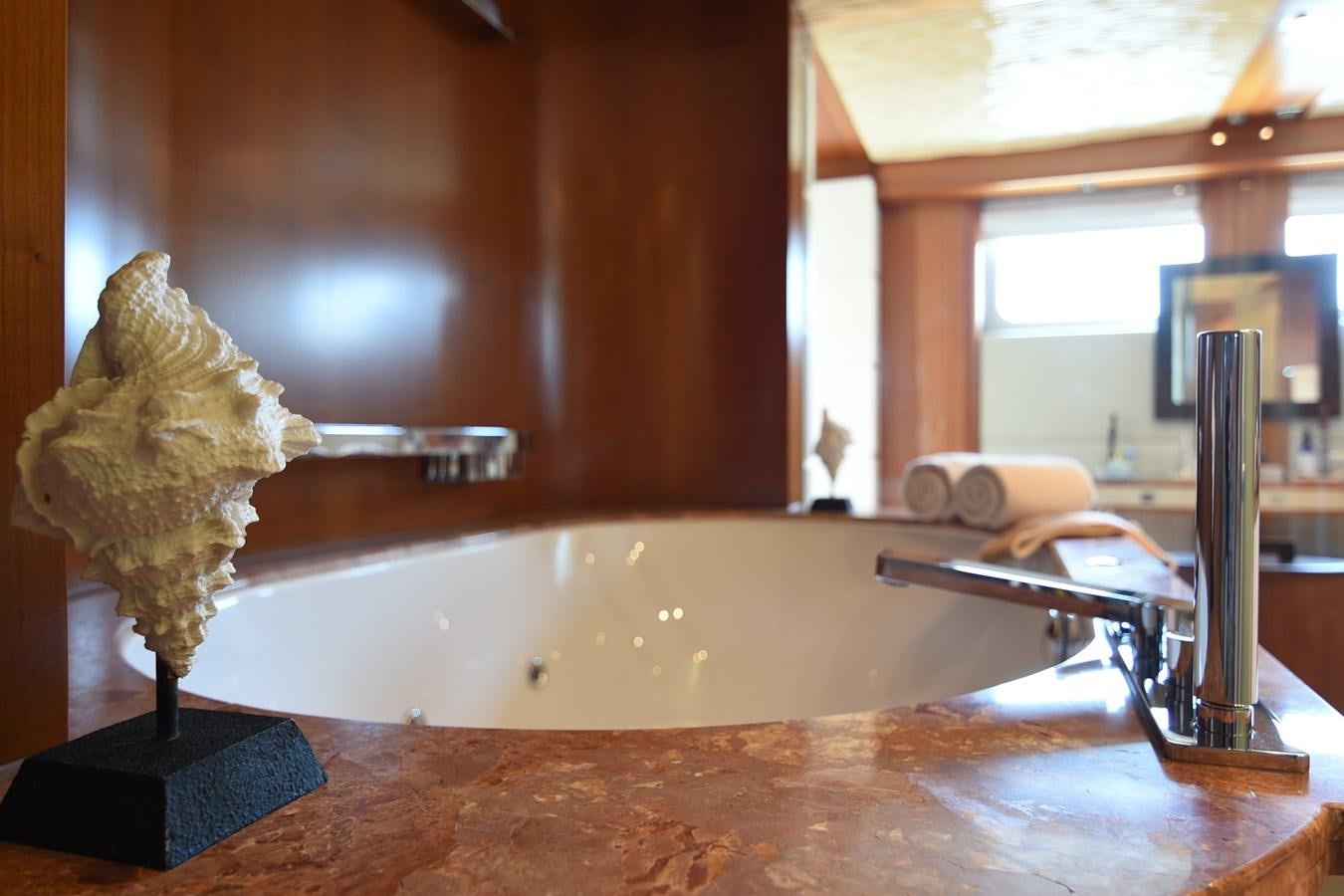 a bathroom sink with a flower aboard LIFE SAGA Yacht for Sale