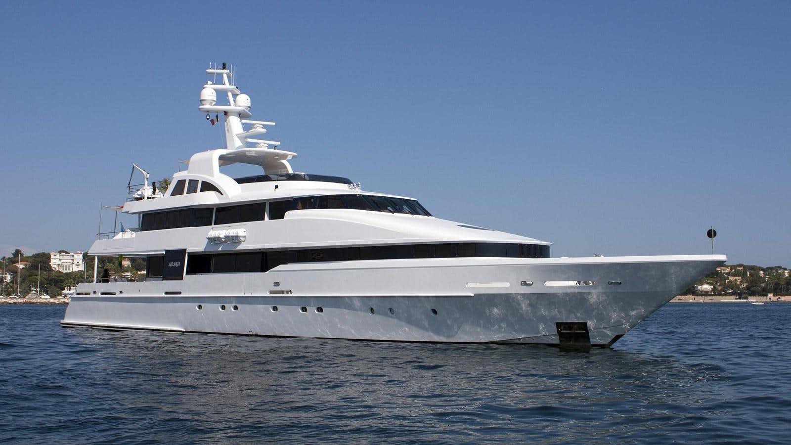 a white yacht on the water aboard LIFE SAGA Yacht for Sale