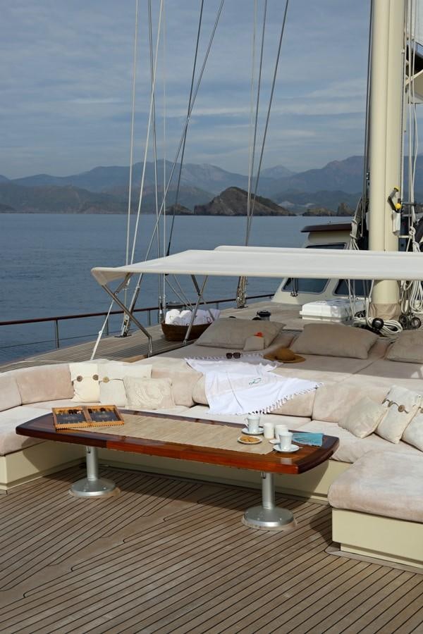 a table on a boat aboard DAIMA Yacht for Sale