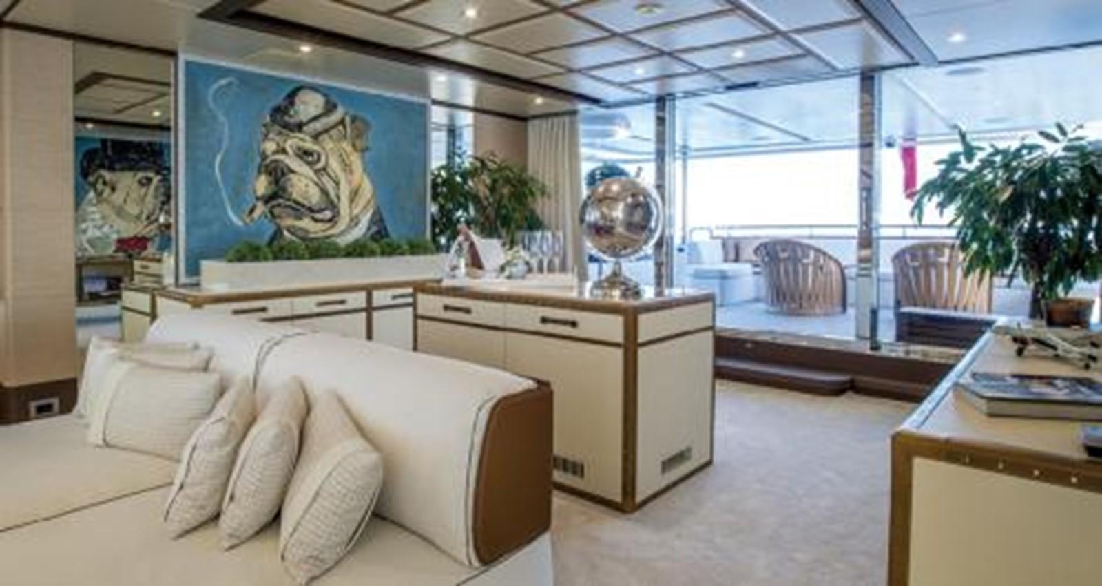 a living room with a large window aboard NELA Yacht for Sale