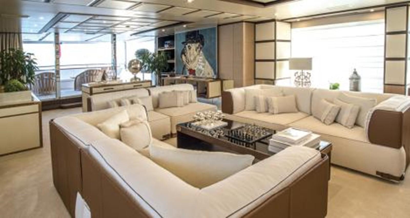 a living room with a large window aboard NELA Yacht for Sale