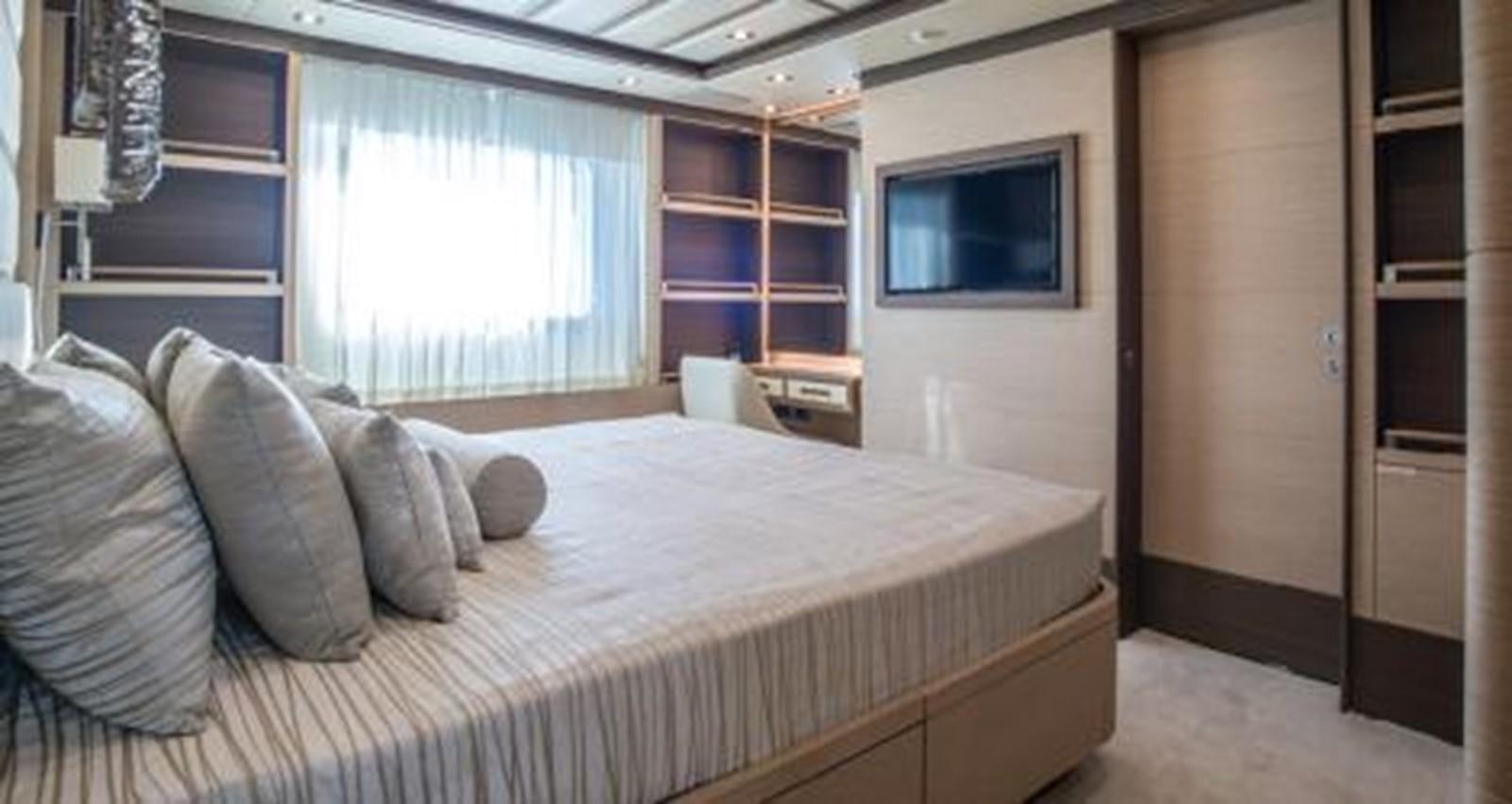 a bed in a room aboard NELA Yacht for Sale
