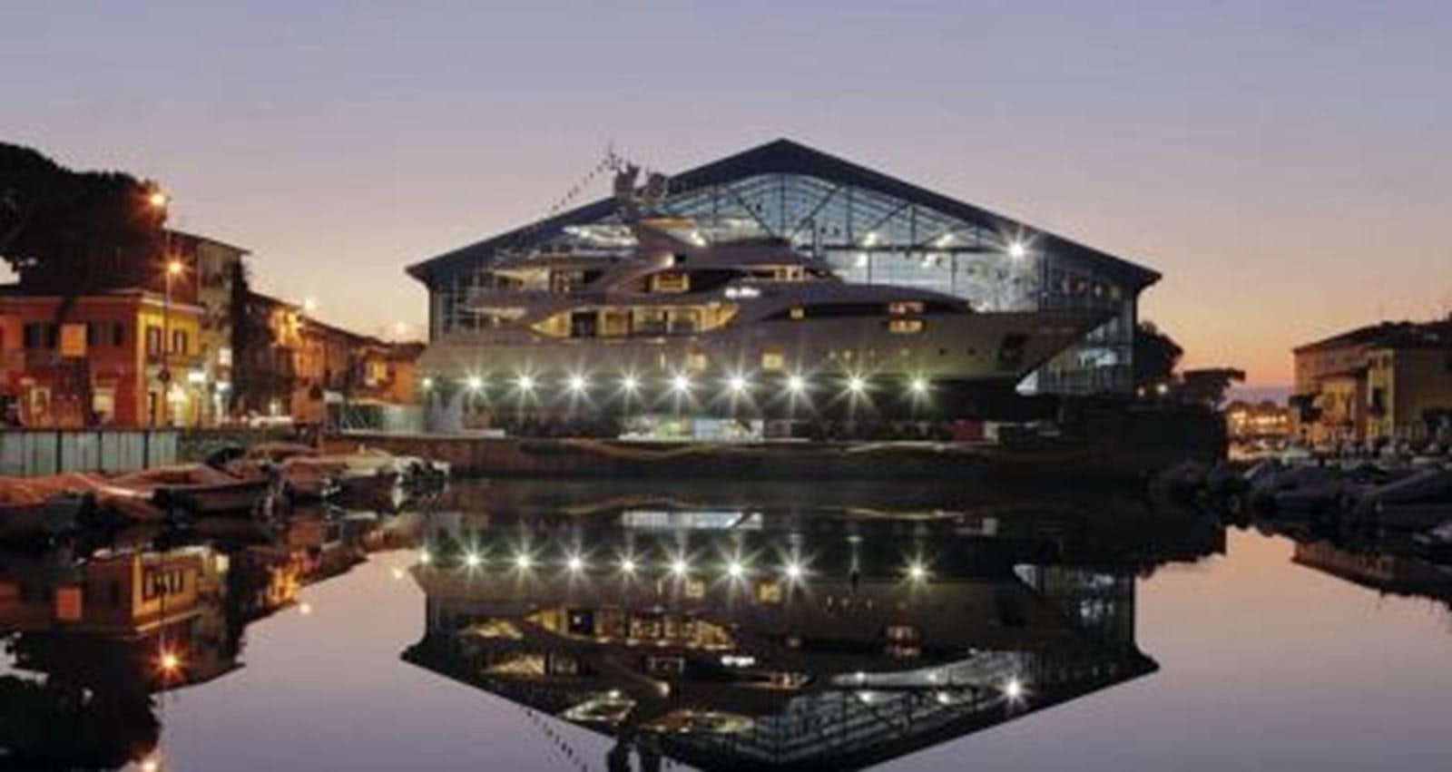 a bridge over water with lights aboard NELA Yacht for Sale