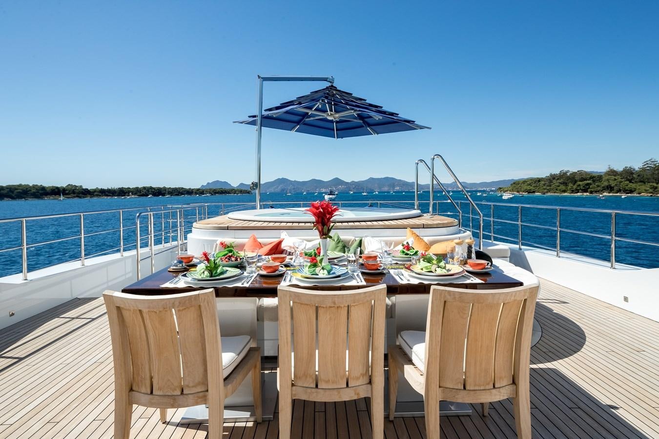 a table with food on it aboard TIMBUKTU Yacht for Sale