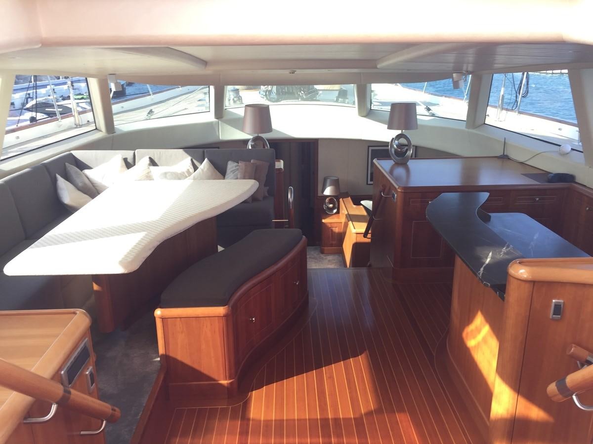 a room with a couple of beds aboard INMOCEAN Yacht for Sale