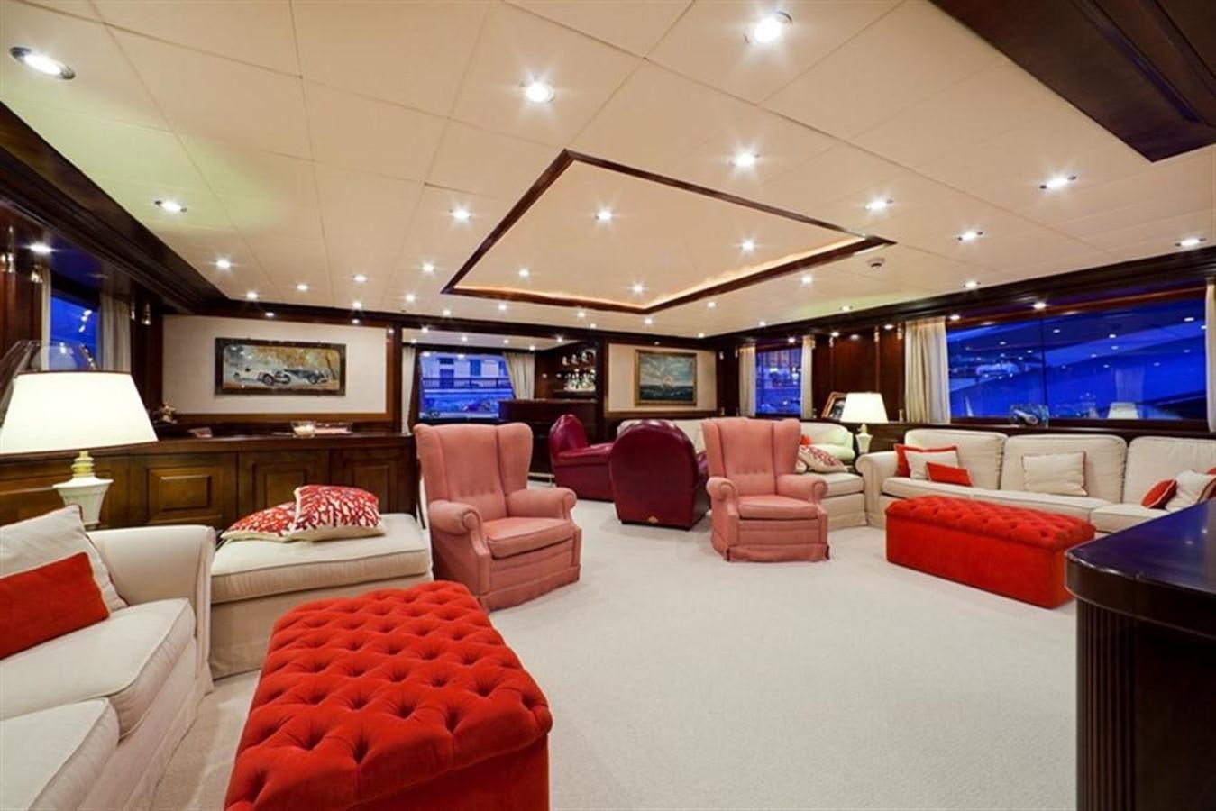 a large room with a large screen aboard SOPHIE BLUE Yacht for Sale