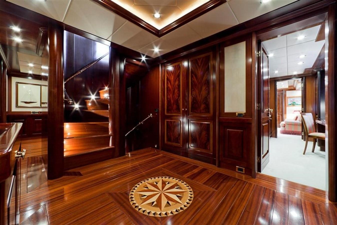 a room with wooden cabinets aboard SOPHIE BLUE Yacht for Sale